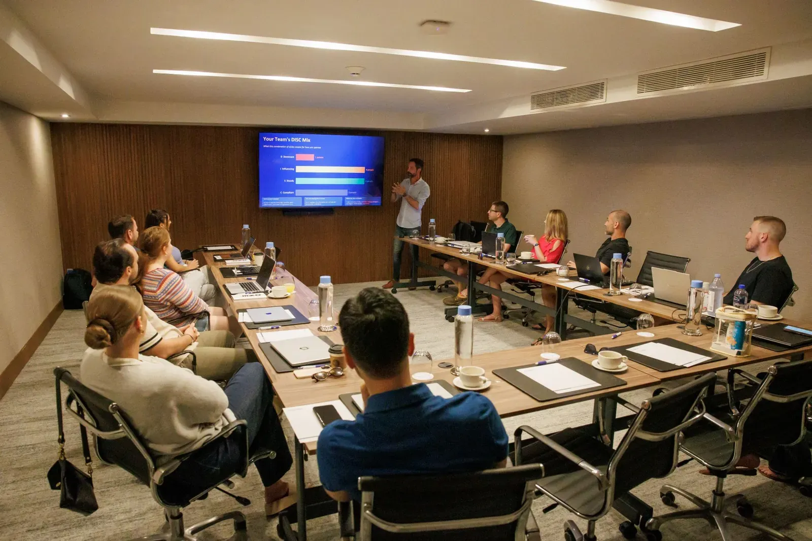 The CompTool team in a working session, with Justin Hampton presenting